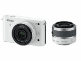 [AMAZON WAREHOUSE DEAL] Nikon 1 J1 Systemkamera (10 Megapixel, 7,5 cm (3 Zoll) Display) weiß inkl. 1 NIKKOR VR 10-30 mm und 10 mm Pancake Objektive für 336,53 Euro inkl. Versand!